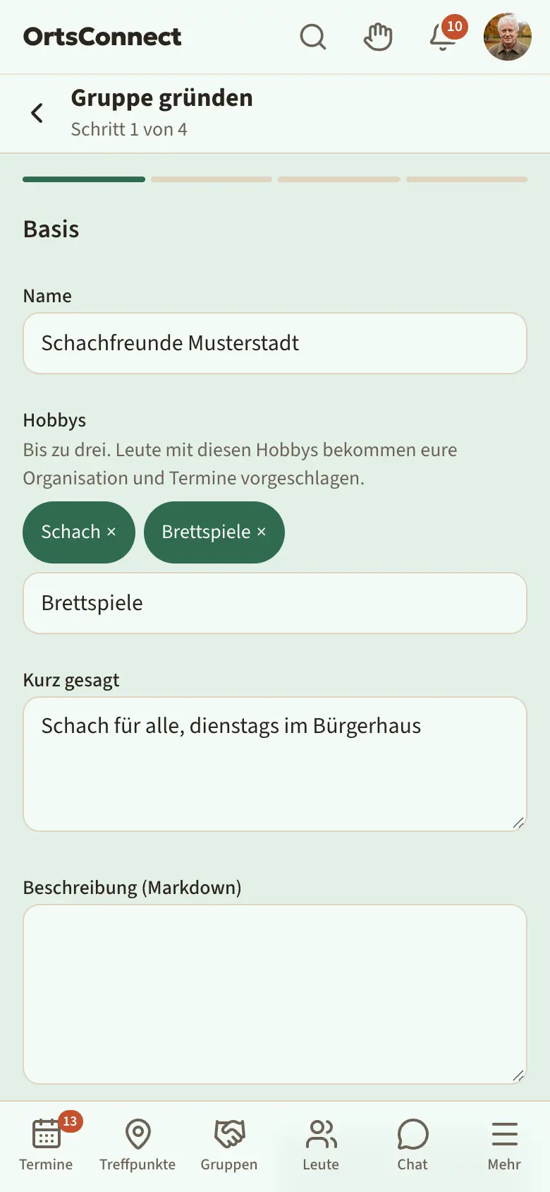 Assistent „Gruppe gründen“, Schritt 1 „Basis“ mit ausgefülltem Namen und zwei gewählten Hobbys unter „Hobbys“, Feld „Hobby suchen …“ darunter
