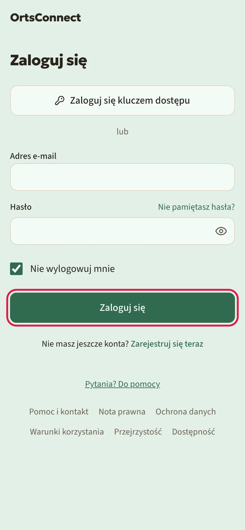 Strona „Zaloguj się” z przyciskiem „Zaloguj się kluczem dostępu” na górze, pod spodem „lub” i pola na adres e-mail i hasło, zaznaczony przycisk „Zaloguj się”